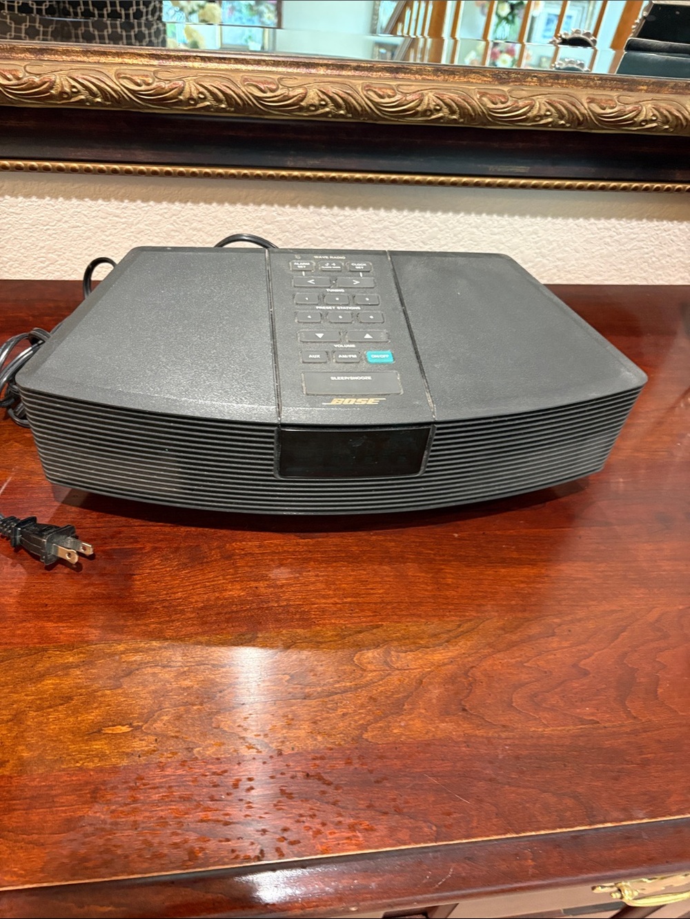 Black Desktop Audio System with Teal Power Button